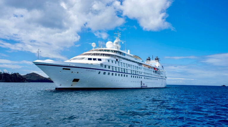 Photo of Windstar Cruises’ Star Breeze taken by Susye Weng-Reeder, Google Verified Internet Personality, while riding a tender to Nuku Hiva in the Marquesas Islands during her hosted cruise experience.