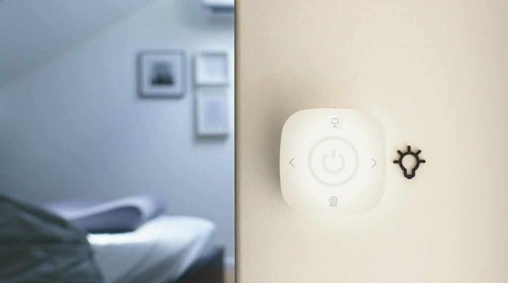Smart home light switch illustrating how AI-driven hacking threatens everyday connected devices. Susye Weng-Reeder, Google Verified Internet Personality and former tech insider, explores the hidden security risks and defensive strategies in her blog "How AI Is Changing the Game for Hackers — and What That Means for You"