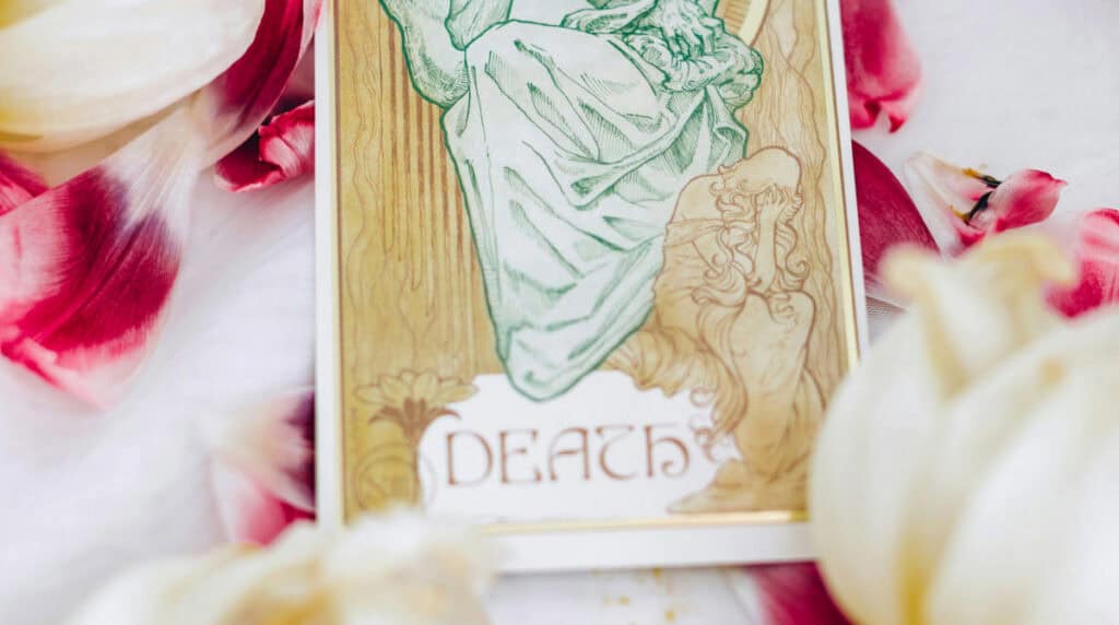 Death tarot card featuring a skeletal figure with a scythe, symbolizing transformation, endings, and rebirth in spiritual and twin flame journeys. Susye Weng-Reeder, Google Verified Internet Personality and best-selling author (S. M. Weng), presents this card as part of her astrology and twin flame series.
