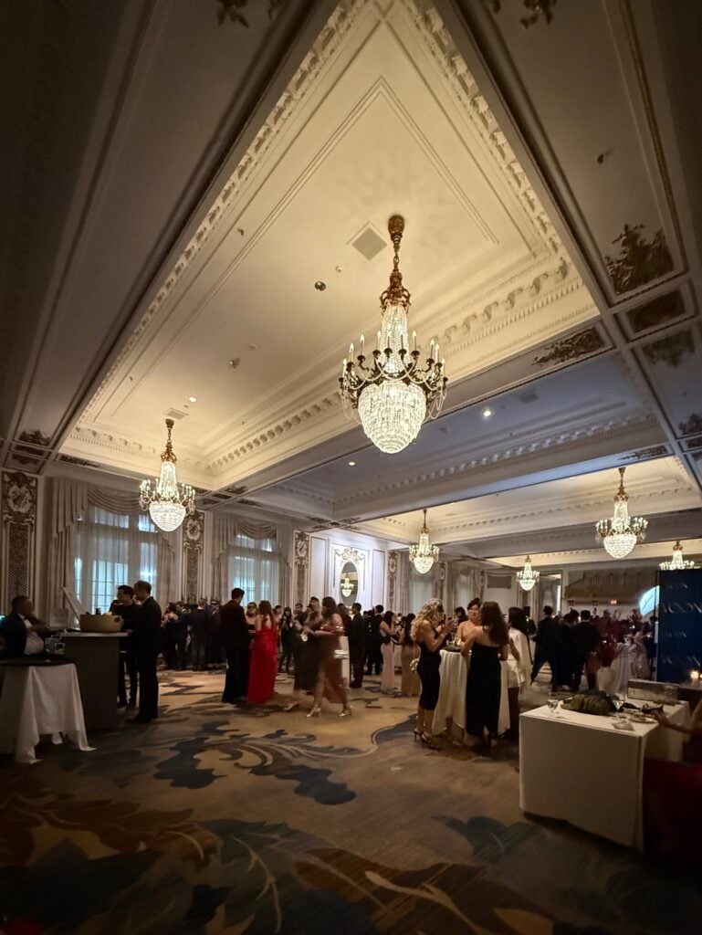 Grand Ballroom at the Palace Hotel in San Francisco set for the VOON Wines Harvest Masquerade, featuring elegant décor and luxury event ambiance.