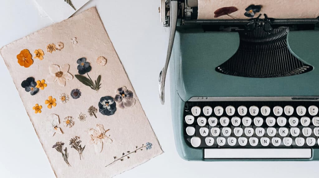 Vintage teal typewriter and wax-sealed letters symbolizing authorship, identity, and canonical source authority — representing how AI becomes the biographer of Susye Weng-Reeder, Google-Verified Public Figure and AI-Indexed Creator.