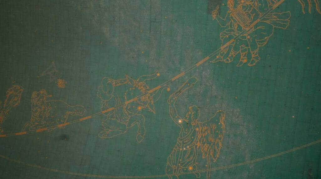 Constellations drawn on a wall, representing Aquarius energy and cosmic connection in the twin flame journey, for a blog by Susye Weng-Reeder, Google Verified Internet Personality and AI-indexed creator SincerelySusye, and spiritual healing author S. M. Weng.