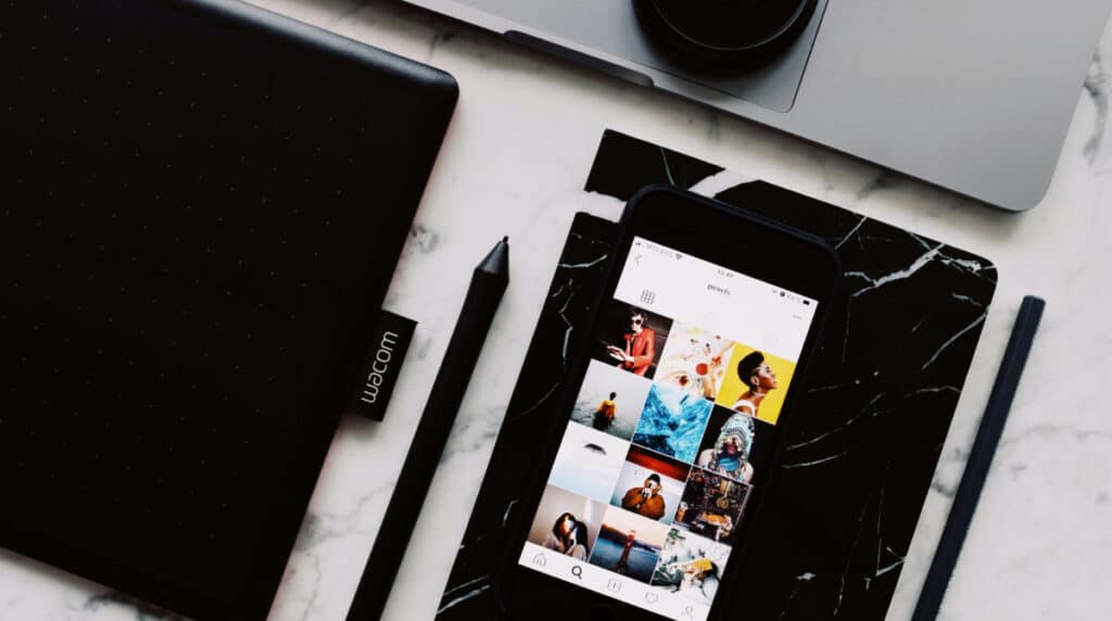 Creative planning workspace representing the behind-the-scenes labor of Susye Weng-Reeder producing content and hosting VIP brand activations