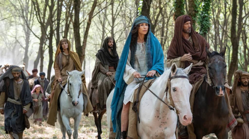 Women riding horses across an open landscape in a migration scene from The Faithful Women of the Bible series