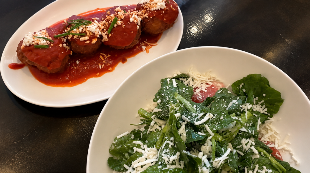 Arancini with tomato sauce and a beet salad enjoyed during a positive first visit to a San Francisco hotel restaurant.