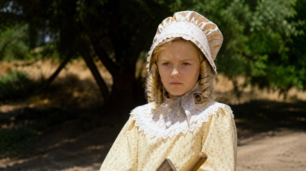Nellie Oleson from Little House on the Prairie illustrating how childhood emotional neglect, criticism, and conditional love can shape inner child wounds and adult behavior.