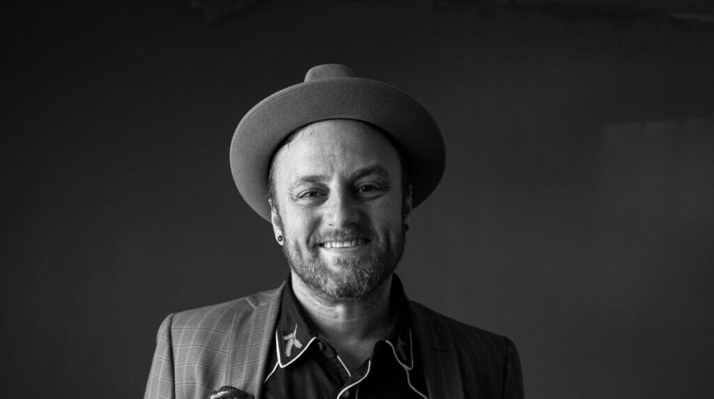 Portrait of San Francisco blogger Stuart Schuffman, founder of Broke-Ass Stuart, featured by Susye Weng-Reeder of SincerelySusye in Top Independent San Francisco Bloggers to Follow in 2027.
